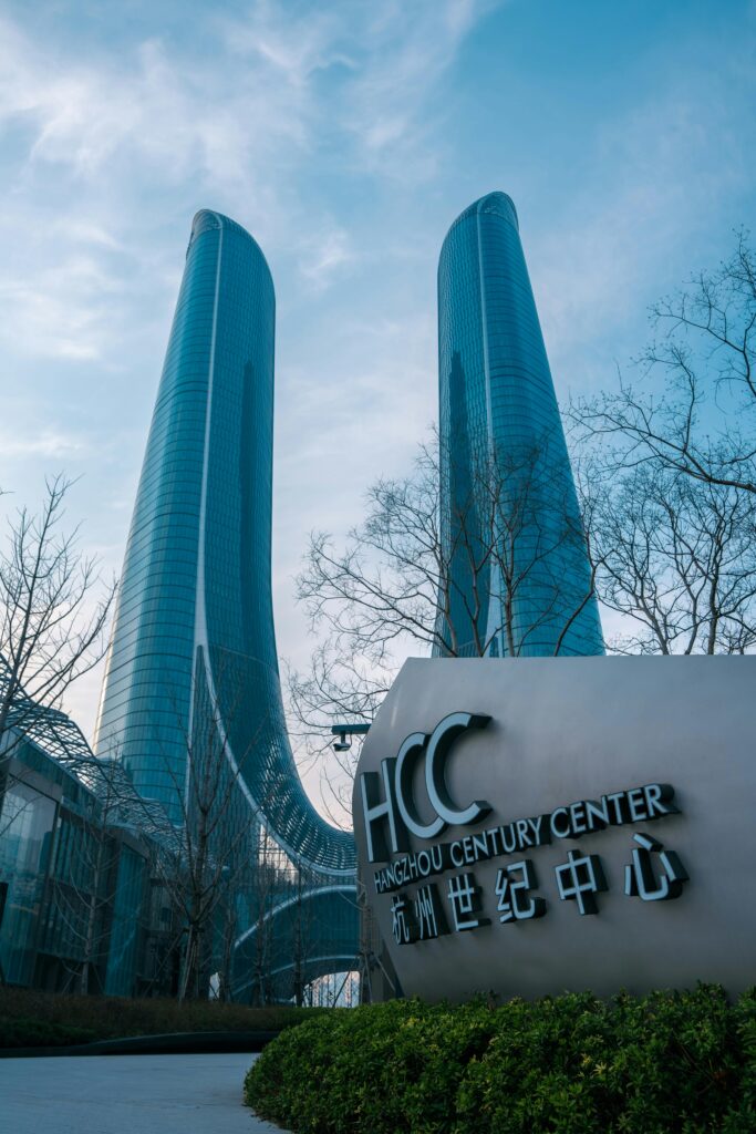 pexels-photo-20602220-20602220 View of Hangzhou Century Center skyscrapers in Hangzhou, Zhejiang, China against a clear sky.